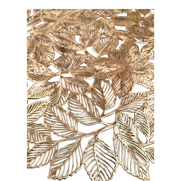 Image of a leaf shaped golden table mat. Perfect table mats for Diwali Decorations in Canada and the USA