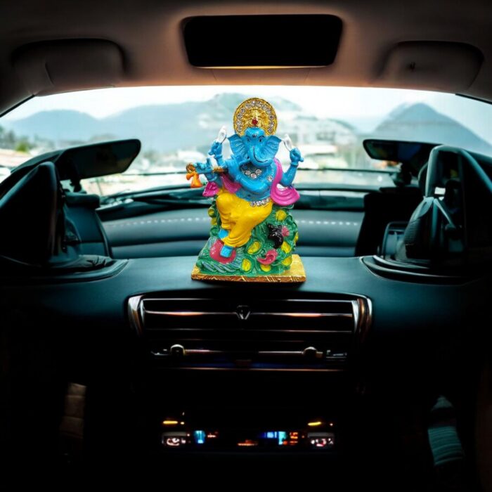 Ganesh playing flute Car dashboard Idol