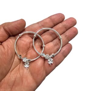Real feel of the pair of silver bracelet for Baby on an Adult hand