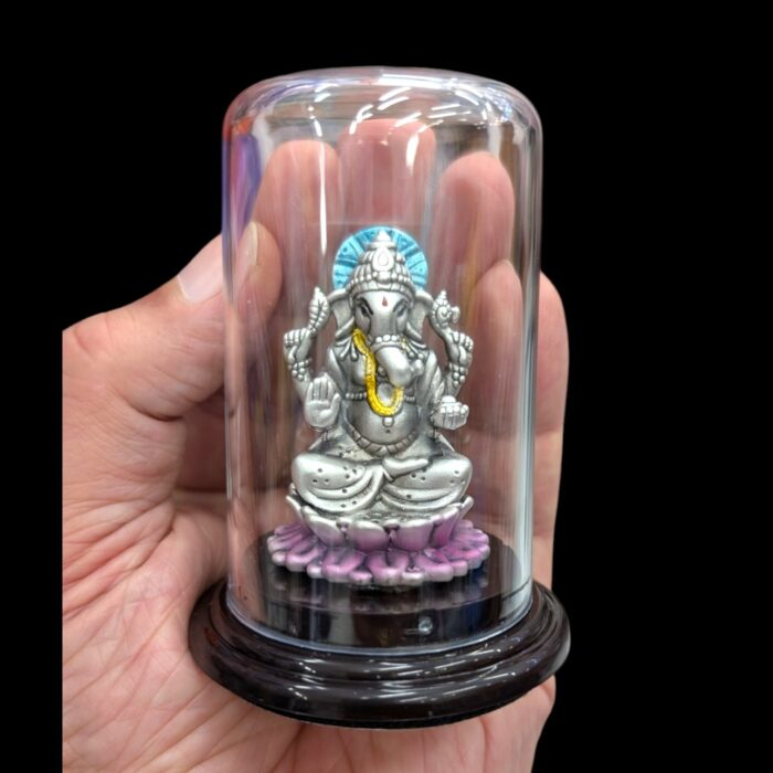 Real life view of the Ganesha Idol in a adult hand