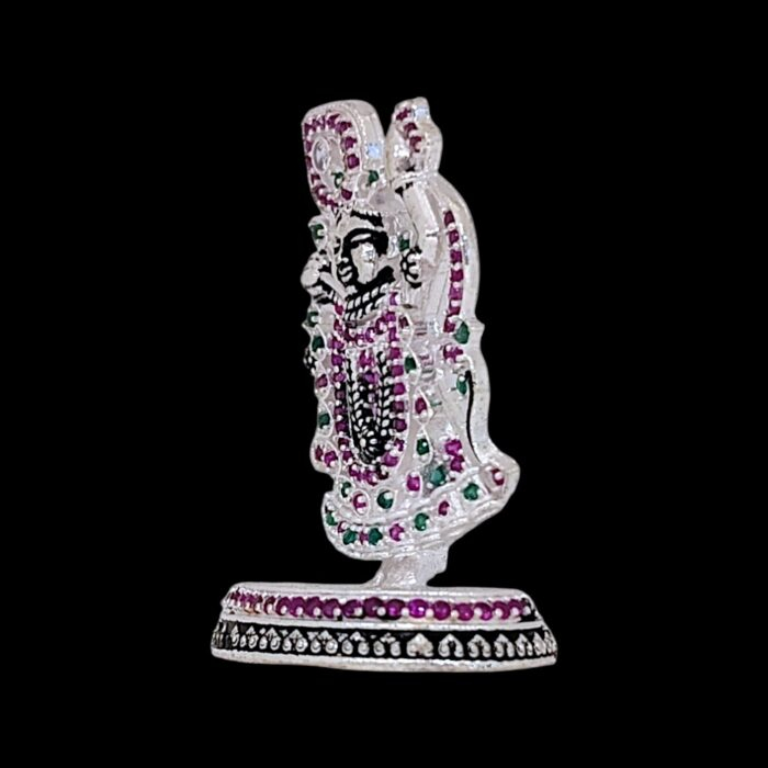 Side view of the Silver Krishna Idol