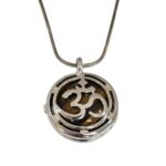 Tiger Eye stone encased in Om pendant necklace with oxidized silver chain