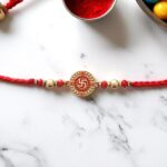 Premium Rakhi with swastik emblem