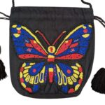 Cotton sling bag with intricate butterfly beadwork