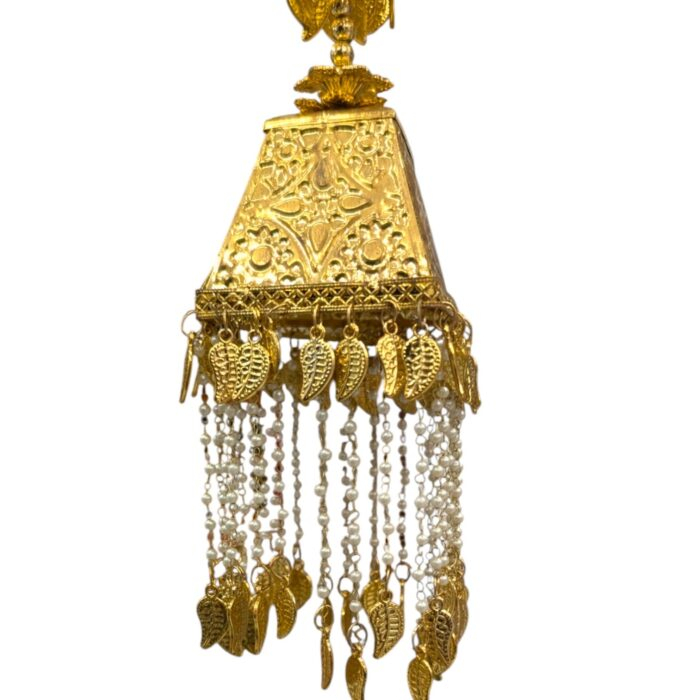 Closeup of Golden Bridal Kaleera with small pearl strings