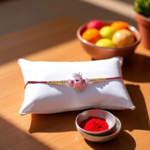 Send Rakhi online to Canada : Cute cartoon character Rakhi for Kids | Peppa Pig Rakhi