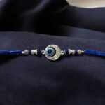 Close up of evil eye Rakhi | Send Rakhi hamper to Canada / USA