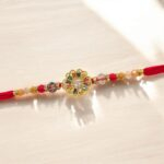 Premium Navratan Rakhi - AD Stone