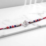 Close up of Pure Silver Rakhi - Om | 925 Sterling Silver Rakhi