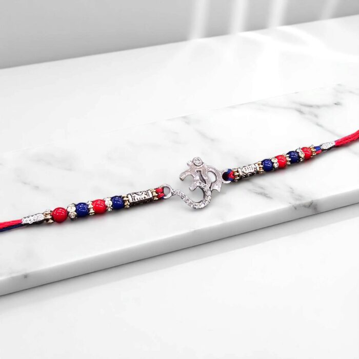 Close up of Pure Silver Rakhi - Om | 925 Sterling Silver Rakhi