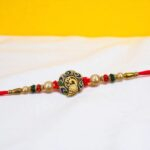 Stylish rakhi with rakhi greeting card in US/Canada
