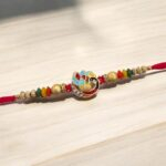 Stylish rakhi with rakhi greeting card in US/Canada