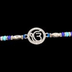 Close up of silver Ik onkar rakhi