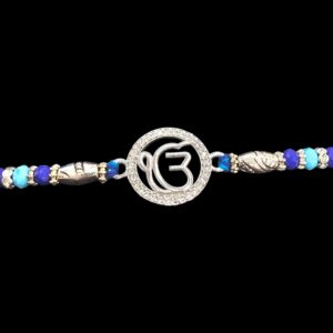 Close up of silver Ik onkar rakhi