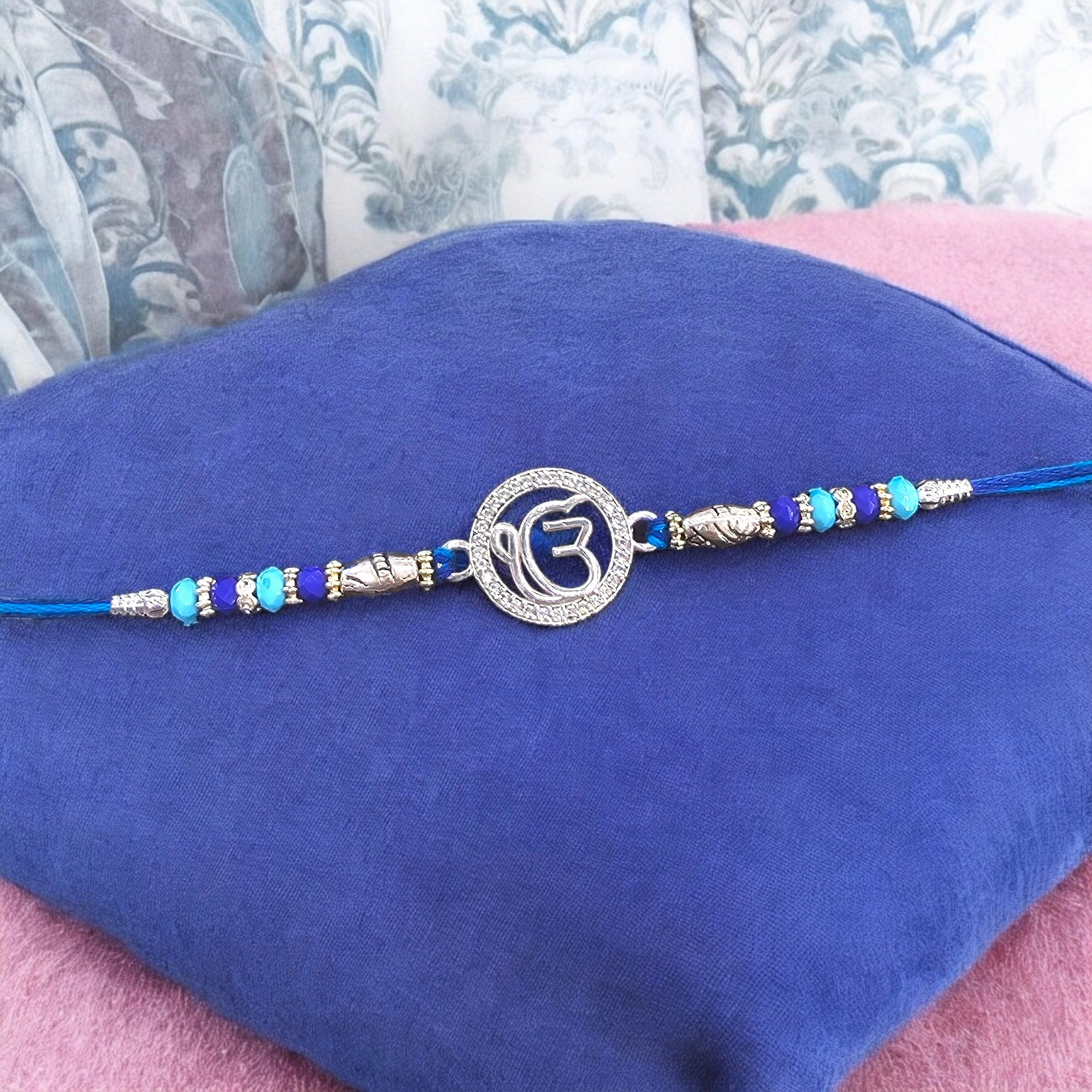 Sterling Silver Ik onkar Rakhi Sterling Silver Ik onkar Rakhi for your brother in Canada/US | Quick shipping across CA and US.