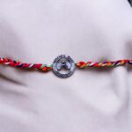 Colorful knotted thread Rakhi with 'World's Best Brother' emblem | Send Rakhi Gift Hamper to Canada and USA