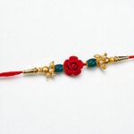 Elegant Bhai Rakhi with matching bhabhi rakhi