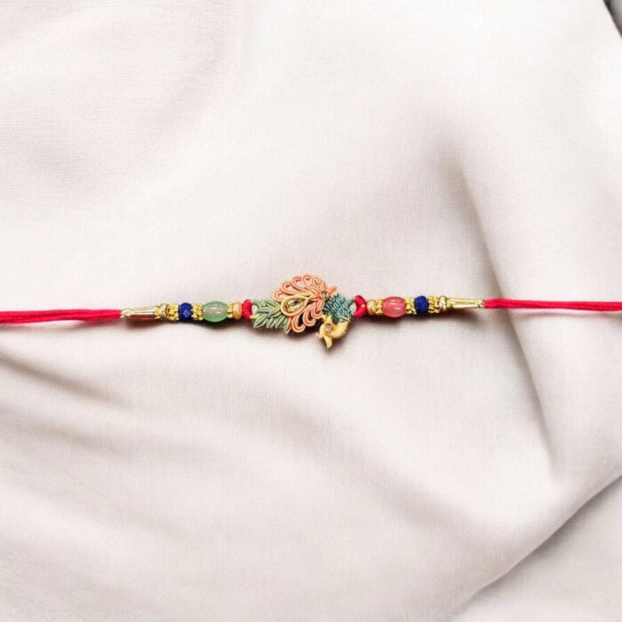 Elegant Bhai Rakhi with matching bhabhi rakhi