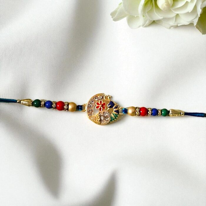 Elegant Bhai Rakhi with matching bhabhi lumba rakhi