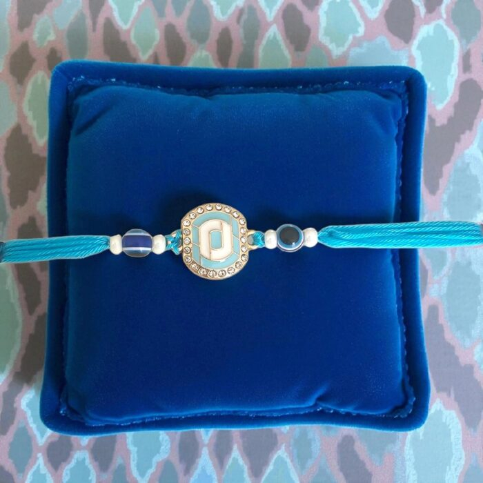 Send Rakhi to Canada : Elegant evil eye Rakhi | Hamper with Indian Mithai