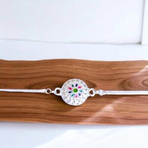 Close up of Stylish silver plated Rakhi in Canada /US | Order from India and pay in local currency
