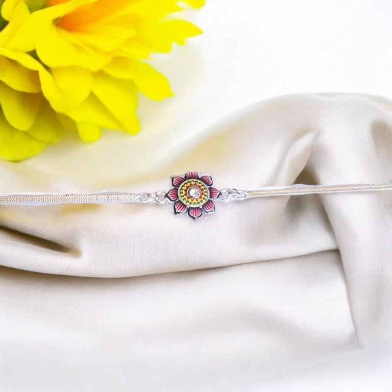 Stylish silver plated Rakhi with meena work flower | Best Rakhi options in Canada