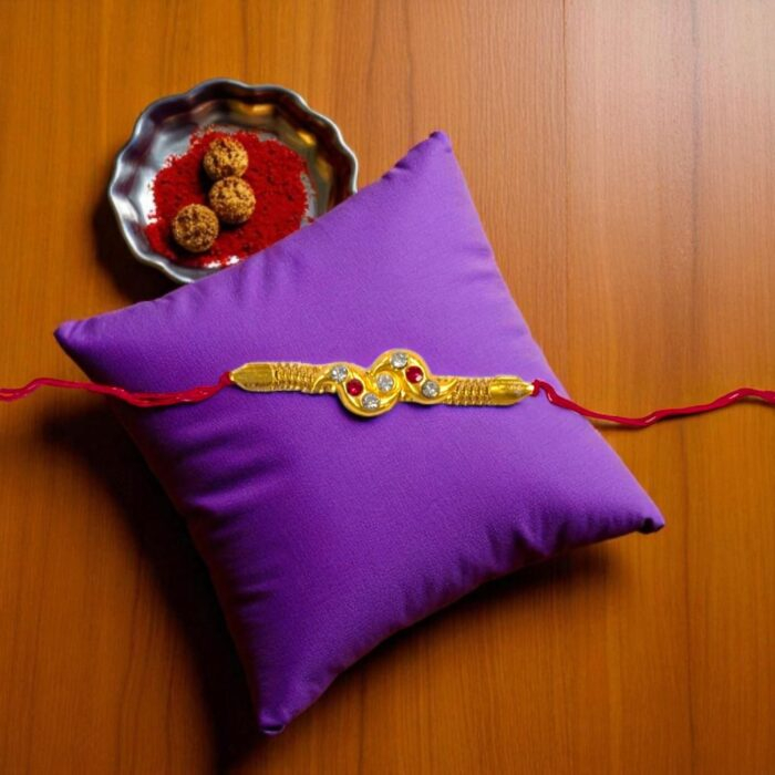 Gold Plated Rakhi with stones