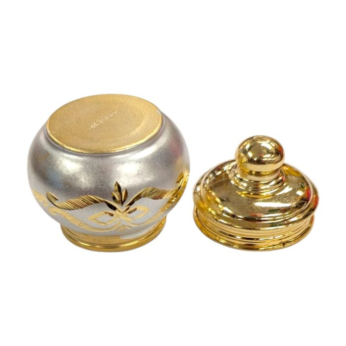 Bottom view of the silver container