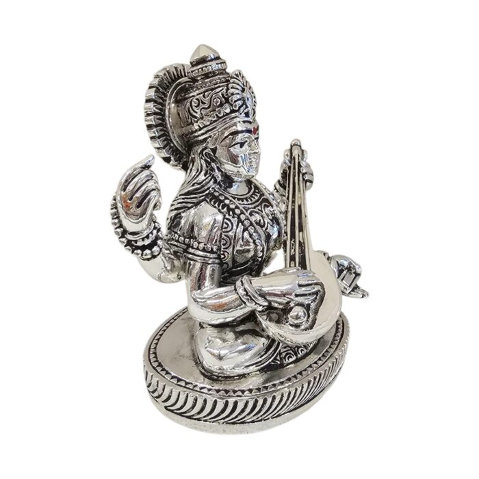Side profile view of Silver plated Saraswati Idol with oxidized finish