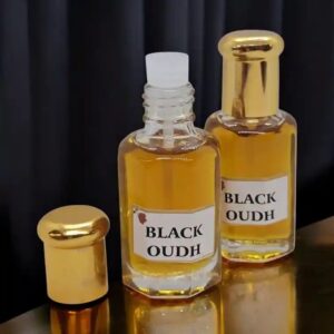 Close up of the smoky Black oudh Attar perfume oil bottles