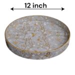 Large 12-inch diameter high-gloss serving tray with gold inlay, perfect for serving appetizers.