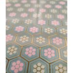 Close-up of the sophisticated gold inlay and high-gloss finish on a serving tray.