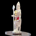 Side profile view of pure silver Murugan Idol