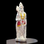 Side profile view of pure silver Murugan Idol