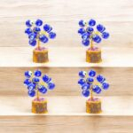 Set of four small evil eye Tree of Life decor pieces arranged for home protection in all directions.