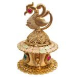 Close-up view of the intricate peacock designed on the sindoor box lid.