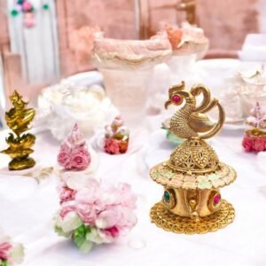 Exquisite Peacock Themed Kumkum Box with detailed engraved bird motif on lid