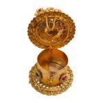 Peacock shaped kumkum box with open lid