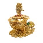 Side profile of Peacock themed kumkum box | Copper made gold plated sindoor container