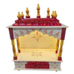 Wooden home Mandir with ample space for idols to be kept inside, softly illuminated by its integrated warm-white LED light.