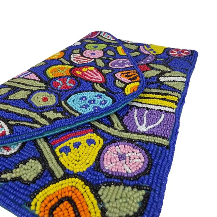 Close-up of handmade blue beadwork clutch purse