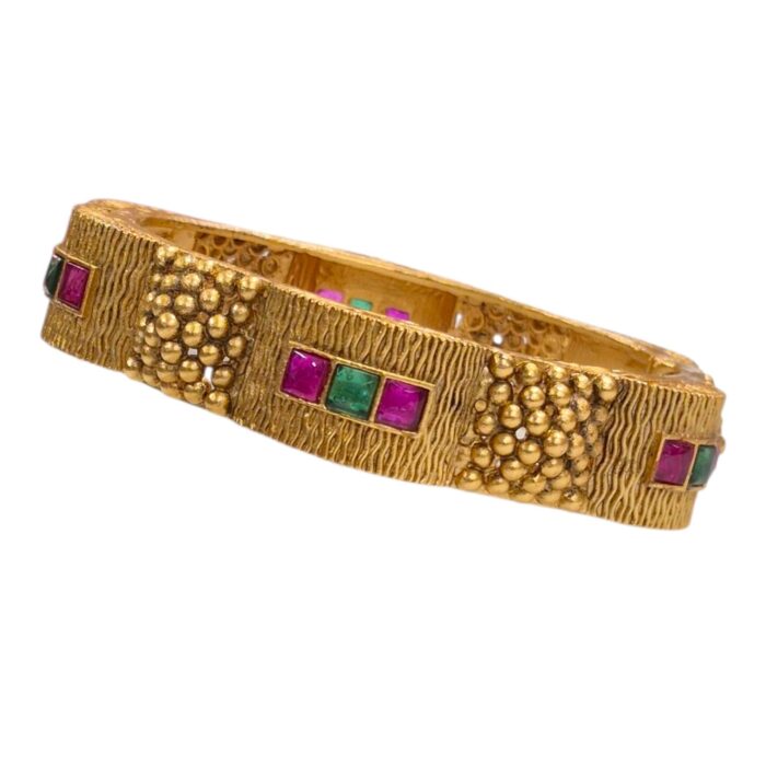Emerald and ruby style stonework on Swarnika Ratna Cuff